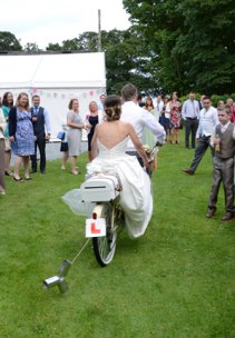 Bride & Groom Leaving on Tandem Bride & Groom Leaving on Tandem